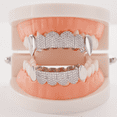 thumbnail image 1 of Copper Zirconia Vampire Fang Grillz for Men & Women, Gold & Silver Tone with Cone & Teardrop Tips, Wave Design Iced Teeth Jewelry for Hip Hop Parties, 1 of 5