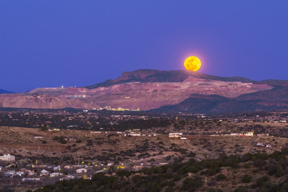 Copper moon rising over the Santa Rita Copper Mine in New Mexico Canvas Art - Alan DyerStocktrek Images (18 x 12)
