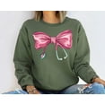 thumbnail image 1 of Coquette Nurse Stethoscope Bow Sweatshirt, Gift for Nurse, Bow Oversized Hoodie, Nurse Appreciation, Christmas Gift for Nurse, Pink Bow, 1 of 5
