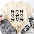 thumbnail image 1 of Coquette Skulls and Bows T-Shirt, Gothic Halloween Tee for Stylish Women, 1 of 6