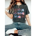 thumbnail image 1 of Coquette USA Bow Shirt, America Bow Shirt for July 4th T-shirt, Memorial Day Shirt, USA Gift,Election Shirt,Patriotic Bow Tee, 1 of 5