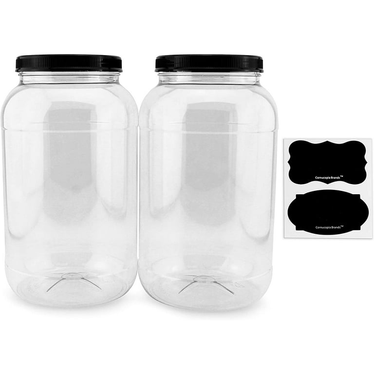 Glass spice jars with black plastic lids. 4 in tall. Diameter 2 in