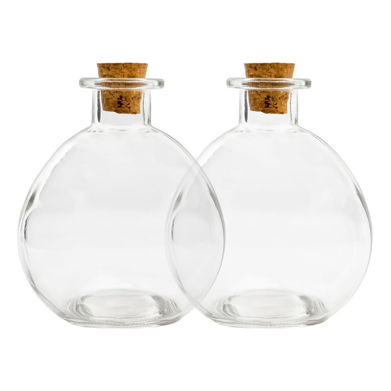 Pair of Large Spherical Clear Glass Bottles