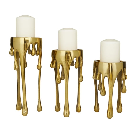 CosmoLiving by Cosmopolitan 3 Candle Gold Aluminum Metal Abstract Drip Candle Holder with Melting Designed Legs, Set of 3