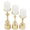 thumbnail image 1 of CosmoLiving by Cosmopolitan 3 Candle Gold Aluminum Metal Pillar Candle Holder, Set of 3, 1 of 8