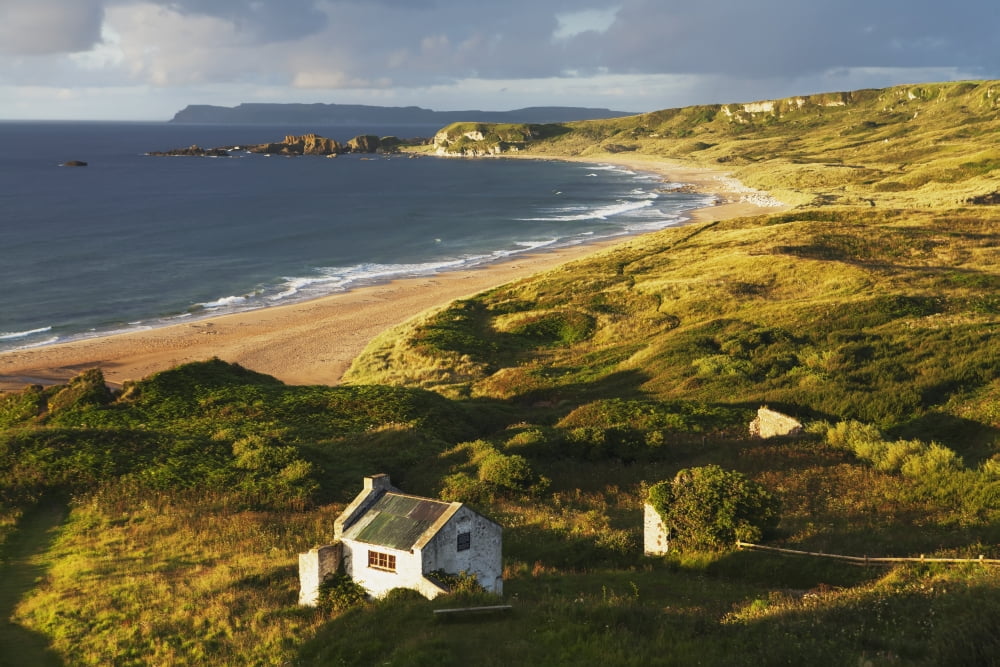 Cottage at White Bay County Antrim Ireland Canvas Art - Carl Bruemmer Design Pics (19 x 12)