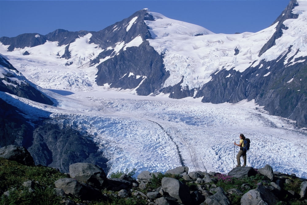 Couple Hiking At Portage Pass WView Of Glacier Ak Canvas Art - Michael DeYoung Design Pics (34 x 22)