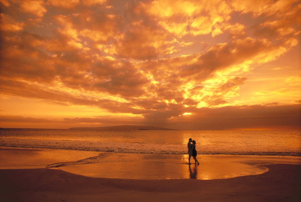 Couple Silhouetted On The Beach During Sunset Fiery Orange Sky Clouds Canvas Art - Dave Fleetham Design Pics (19 x 12)
