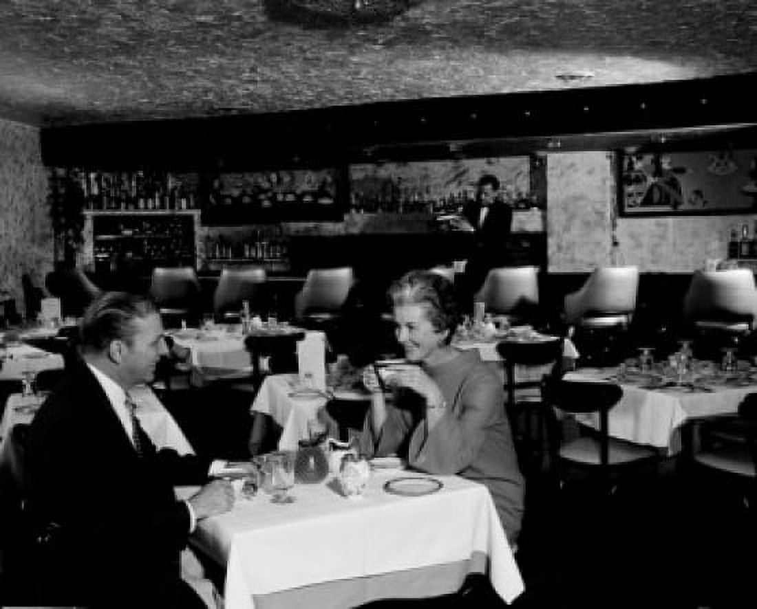 Couple dining in restaurant Canvas Art - (18 x 24)