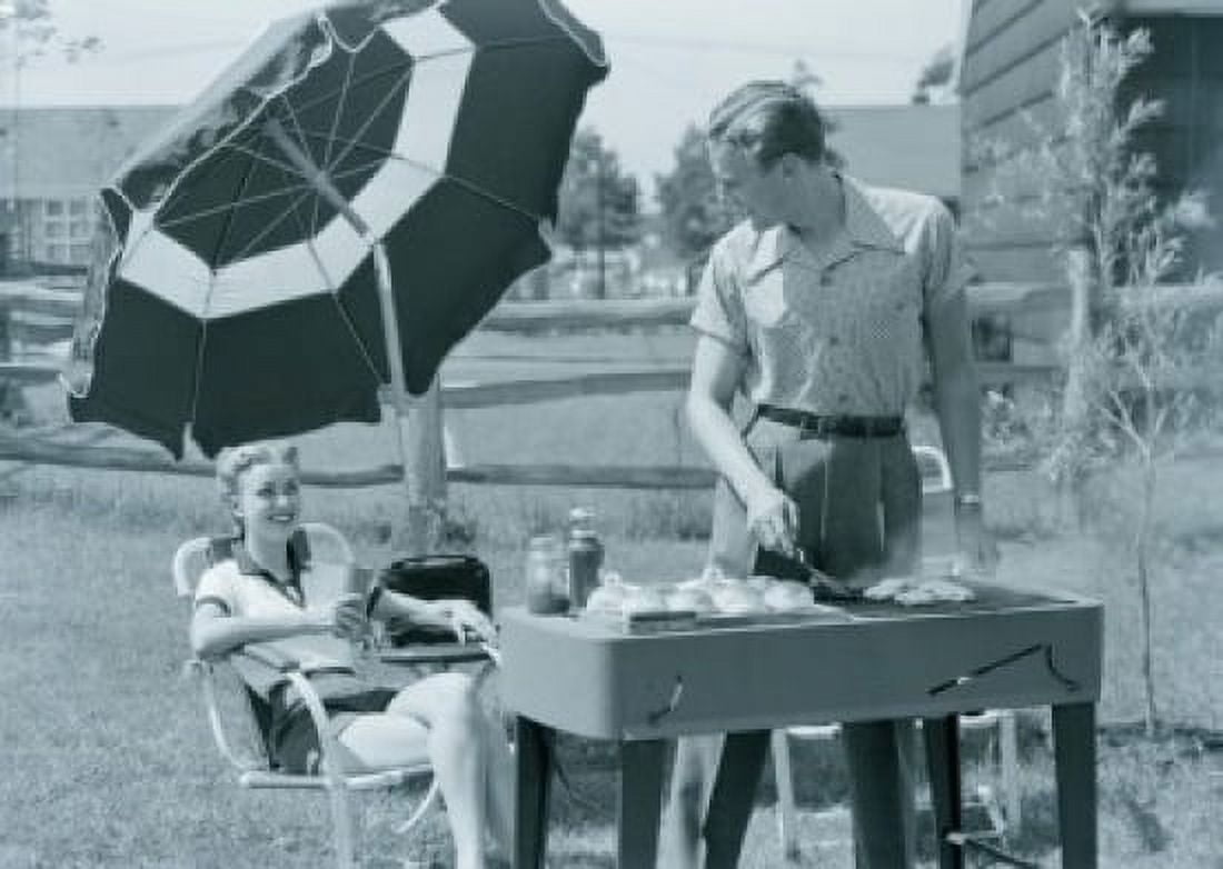 Couple having barbecue in garden Canvas Art - (18 x 24)