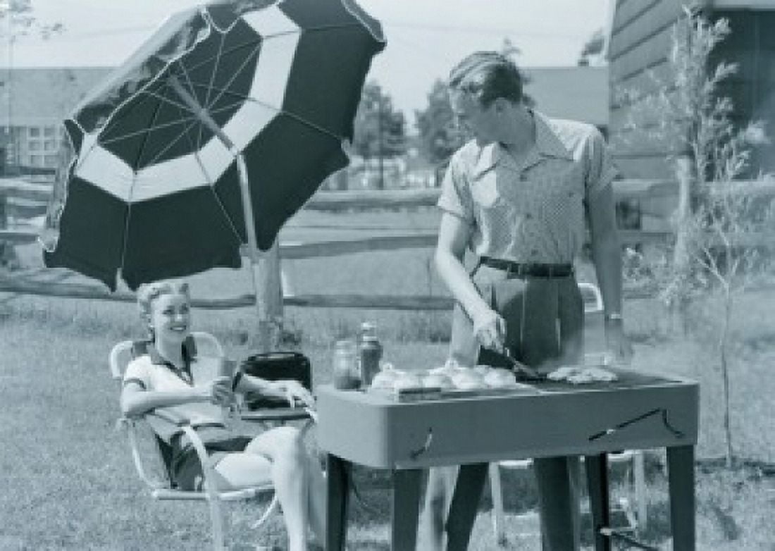 Couple having barbecue in garden Canvas Art - (24 x 36)