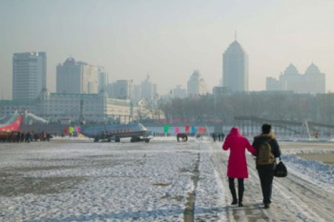 Couple walking on a frozen river Songhua River Harbin Heilungkiang Province China Canvas Art - Panoramic Images (36 x 24)