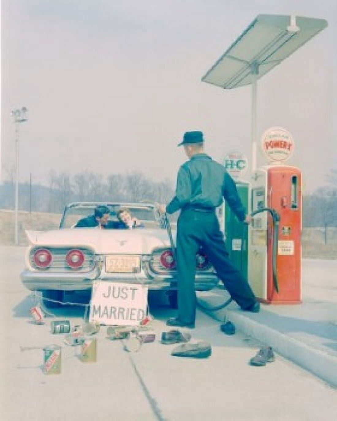 Couple with Just Married sign driving through gas station Canvas Art - (18 x 24)