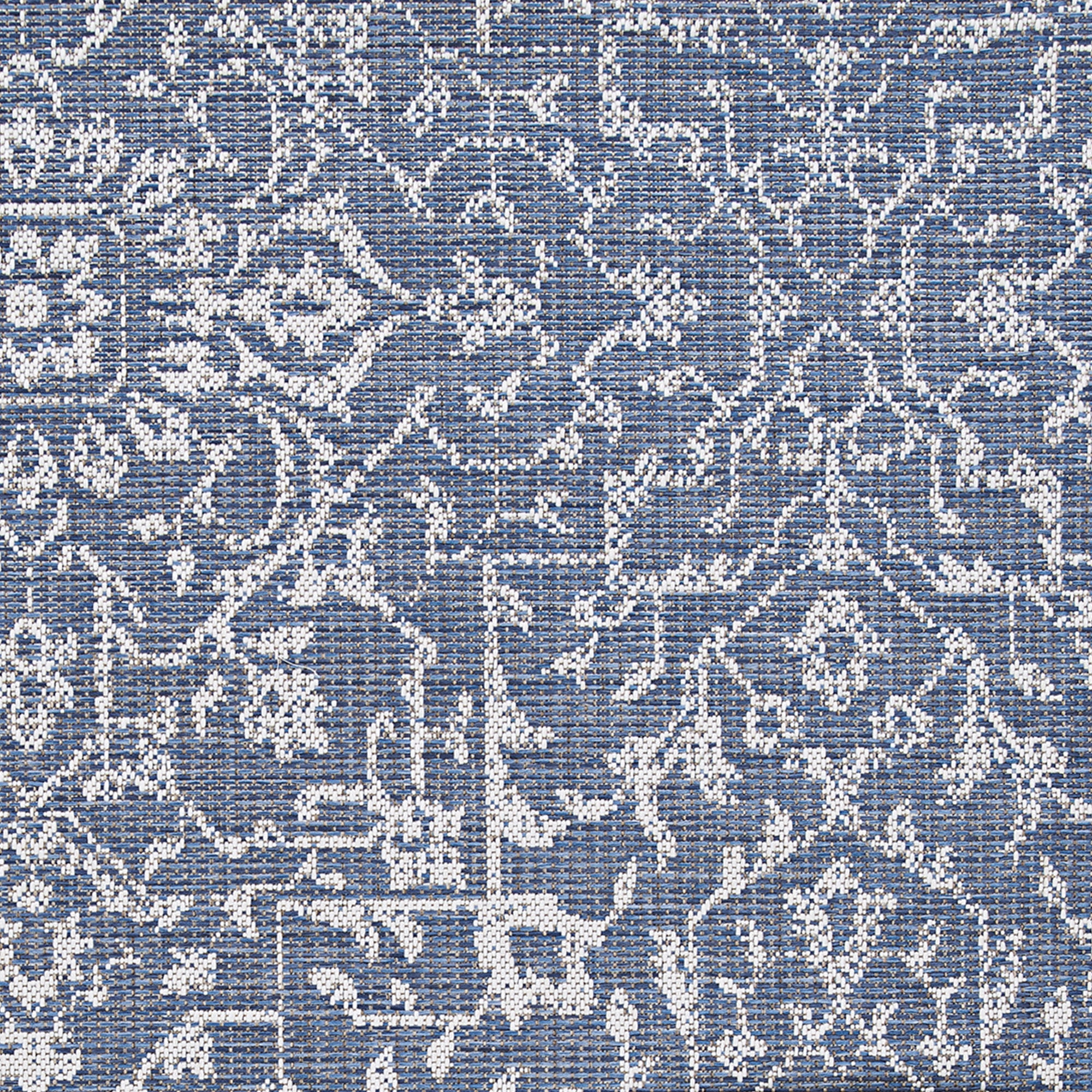 Couristan 5.5' x 9' Ocean Blue and Ivory Outdoor Floral Rectangular Area Throw Rug