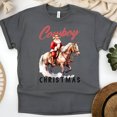 thumbnail image 1 of Cowboy Santa Claus Graphic T-Shirt | Western Holiday Tee for Men Women, Dark Heather, Size 2XL, 1 of 6