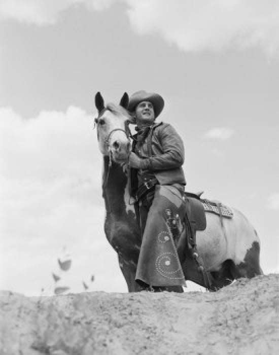 Cowboy on top of escarpment Canvas Art - (18 x 24)