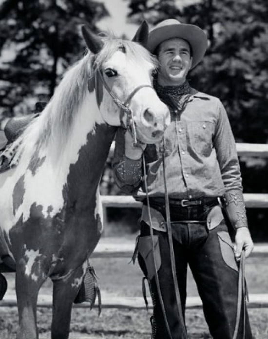 Cowboy standing with his horse smiling Canvas Art - (24 x 36)