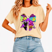 Cozymy Women Fun Bat Castle Bow T-shirt Glow Neon Print Top Bold Colorful Tee for Halloween Festival Nights
