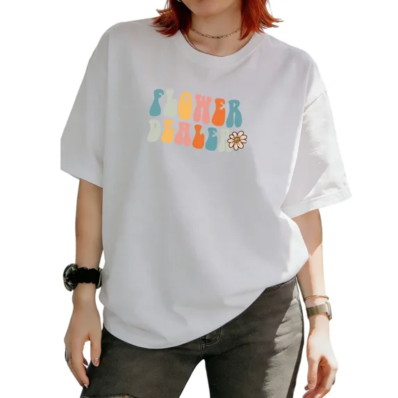 Cozymy Women's Retro Groovy Flower Dealer Text With Daisy Graphic Short Sleeve T‑Shirt Hippie Boho Summer Tees