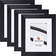 thumbnail image 1 of Craig Frames Modern Aesthetics 125, 5x7 inch Picture Frame Matted for a 4x6 Photo, Black, Set of 4, 1 of 5