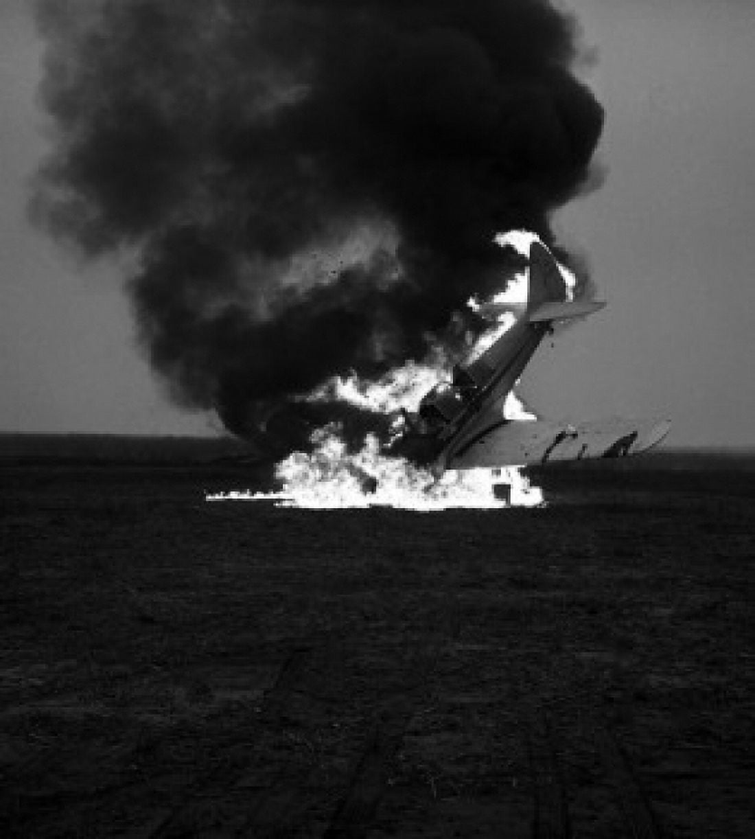 Crashed airplane exploding Canvas Art - (24 x 36)