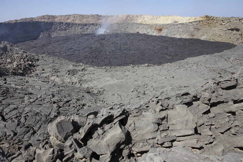 Crater floor covered with basaltic lava flows Erta Ale volcano Danakil Depression Ethiopia Canvas Art - Richard RoscoeStocktrek Images (35 x 23)