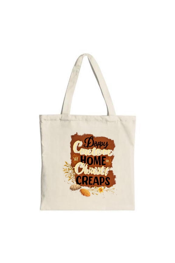 Cream Canvas Tote Bag with " Doppy Cassoulet at Home Creeps " in black and orange adorned with cassoulet dish and floral designs