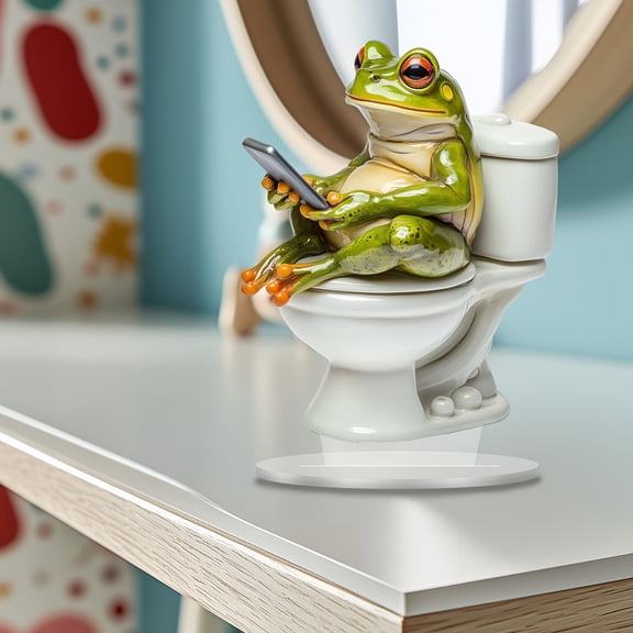 Creative and fun frog sitting on the toilet - home decoration, room decoration, office desktop decoration. gifts for friends