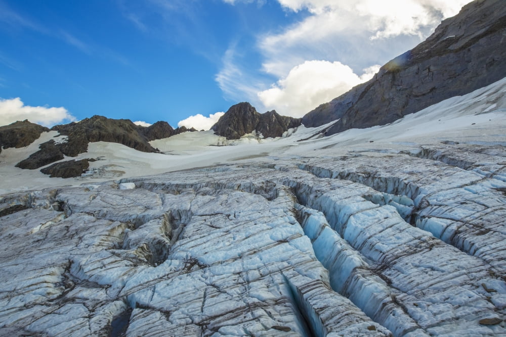 Crevasses cover an unnamed glacier atop the Chugach Mountains near Valdez Alaska United States of America Canvas Art - Zachary Sheldon Design Pics (38 x 24)