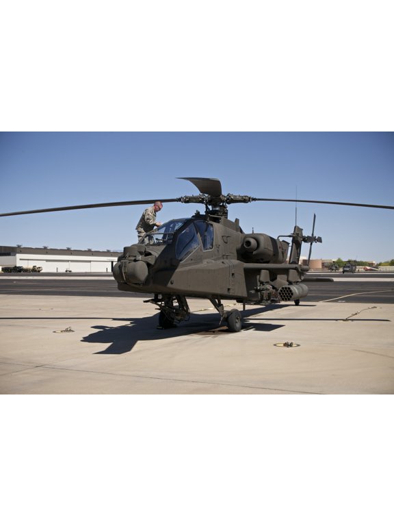 Crew chief cleaning the canopy of an AH-64D Apache Longbow Canvas Art - Terry MooreStocktrek Images (18 x 12)