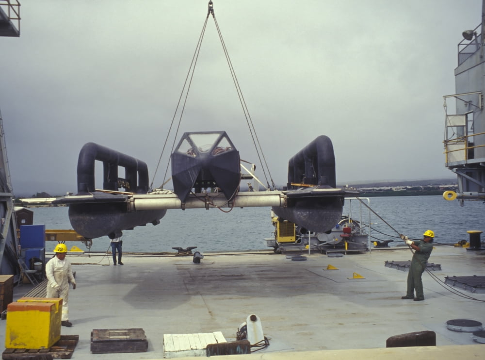 Crewmen lift the Naval Special Warfare Subtrap from the waters of Pearl Harbor Canvas Art - Michael WoodStocktrek Images (33 x 25)