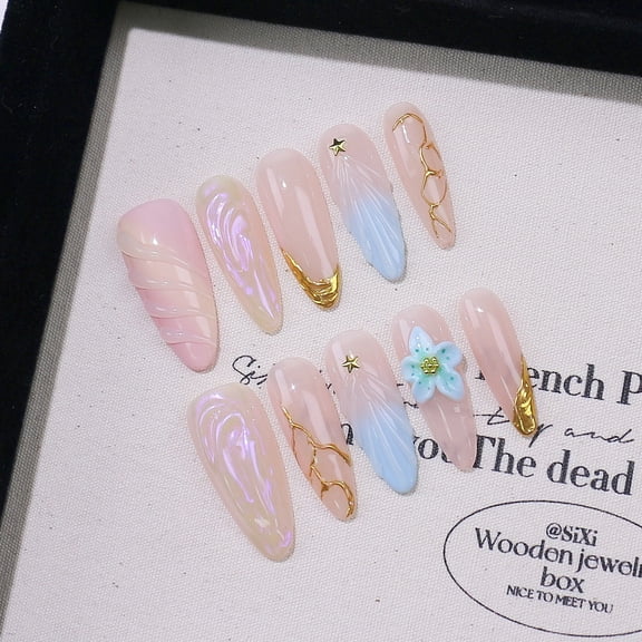 Cross-border medium and long almond-shaped fake nails are purely hand-carved with high-end French shell pattern, and the wearing armor is removable.
