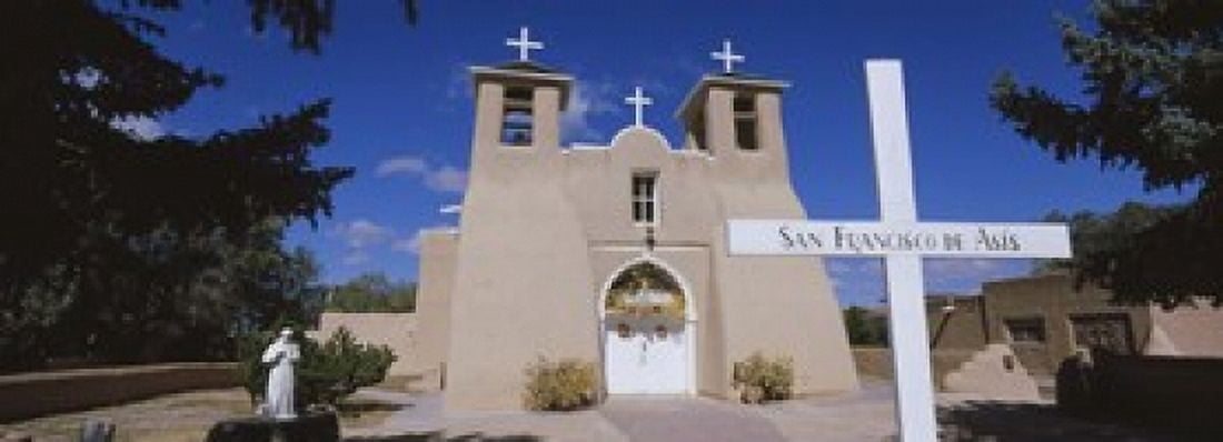 Cross in front of a church San Francisco de Asis Church Ranchos De Taos New Mexico USA Canvas Art - Panoramic Images (18 x 7)