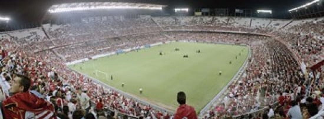 Crowd in a stadium Sevilla FC Estadio Ramon Sanchez Pizjuan Seville Seville Province Andalusia Spain Canvas Art - Panoramic Images (18 x 7)