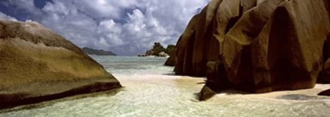 Crystal clear waters and large granite rocks on Anse Source dArgent beach La Digue Island Seychelles Canvas Art - Panoramic Images (18 x 7)