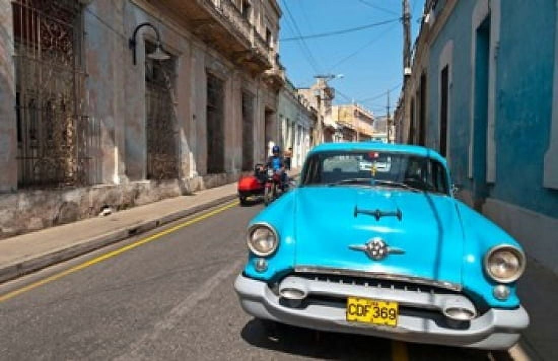 Cuba Camaquey Oldsmobile car and buildings Canvas Art - Bill Bachmann DanitaDelimont (29 x 19)