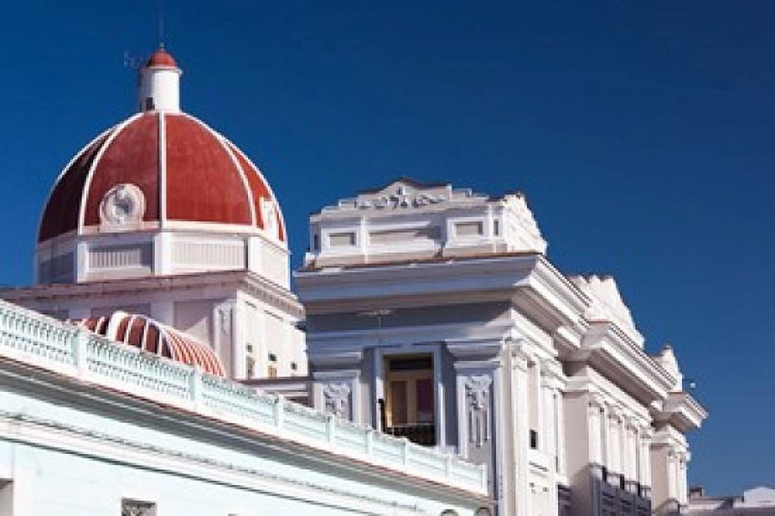 Cuba Cienfuegos town buildings Canvas Art - Walter Bibikow DanitaDelimont (28 x 19)