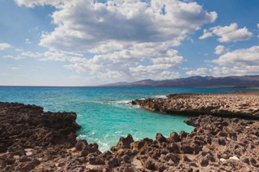 Cuba Trinidad Playa Ancon beach ocean cove Canvas Art - Walter Bibikow DanitaDelimont (28 x 19)