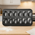 thumbnail image 1 of CuiLiyq 1 Pack Nonstick Madeleine Pan for Baking, 12 Cavity Shell Shape Cake and Cookie Mold Tray, for French Cookies Brownies Pastries (Black), 1 of 6