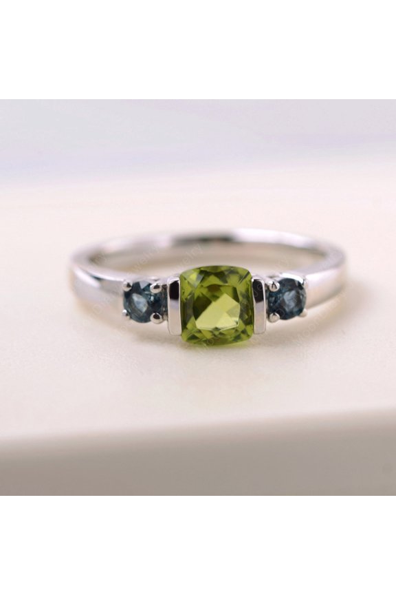 Cushion cut 6 mm peridot ring with London blue topaz side stones custom August/ November birthstone ring
