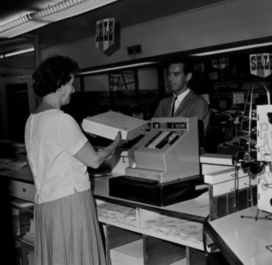Customer and clerk in store Canvas Art - (18 x 24)