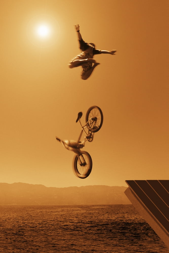 Cyclist Going Off Jump Into Water In Brown Tones Canvas Art - Don Hammond Design Pics (22 x 34)