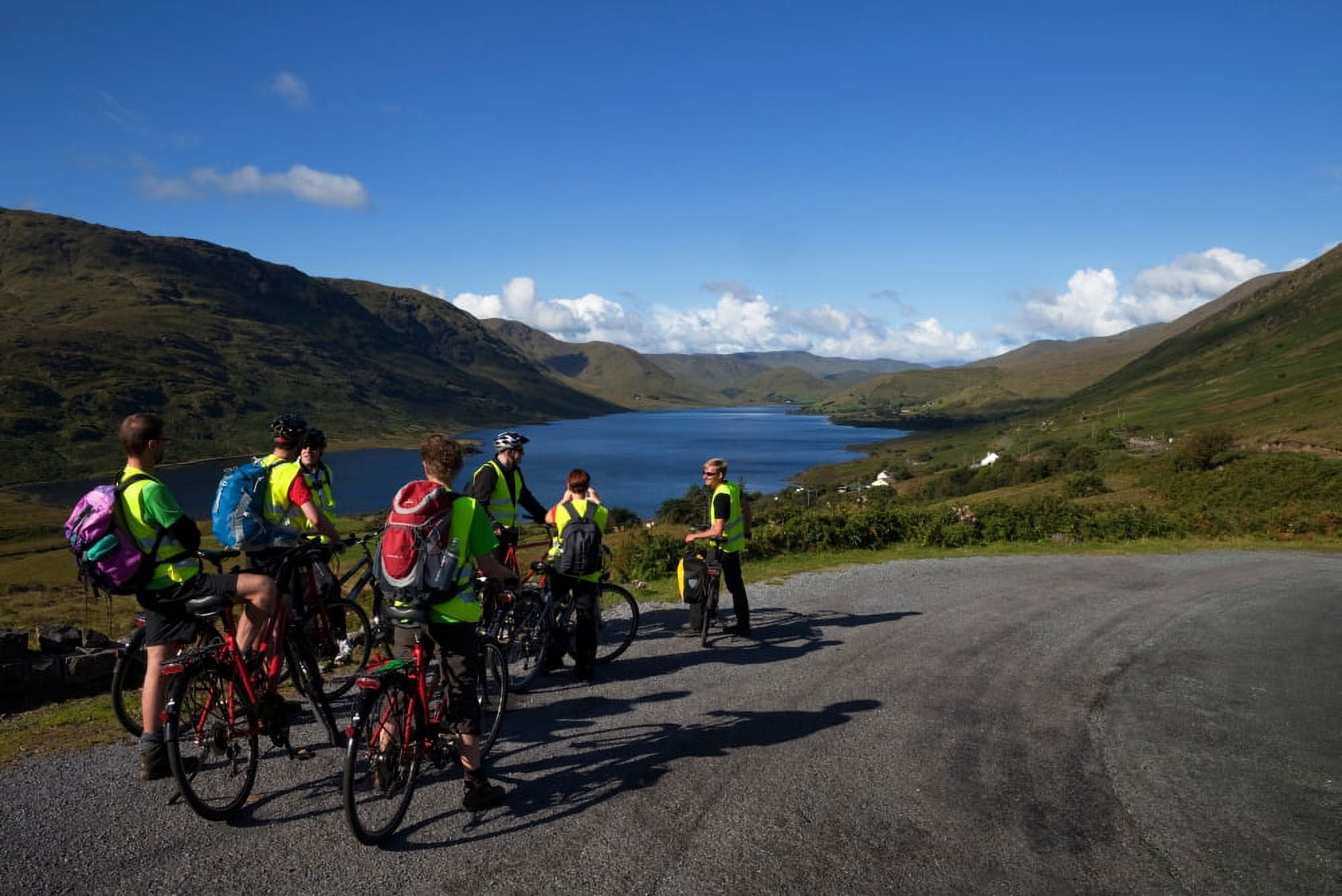 Cyclists above Lough Nafooey shot from the County Mayo side of the borderMost of the lake is in County Galway (Joyces County) Ireland Canvas Art - Panoramic Images (27 x 9)