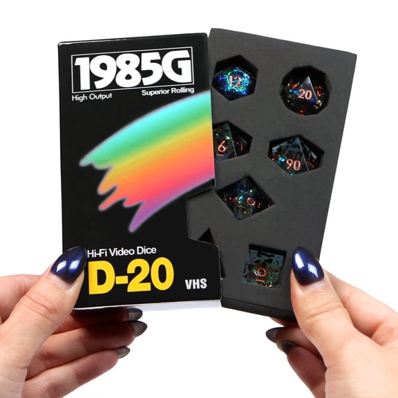 1985 Games, Starstorm DND RPG Dice Set with Retro VHS Case, Polyhedral Resin, Adult - 7 Piece