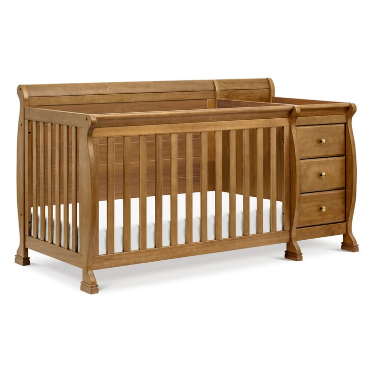 Cot with changing table attached hotsell