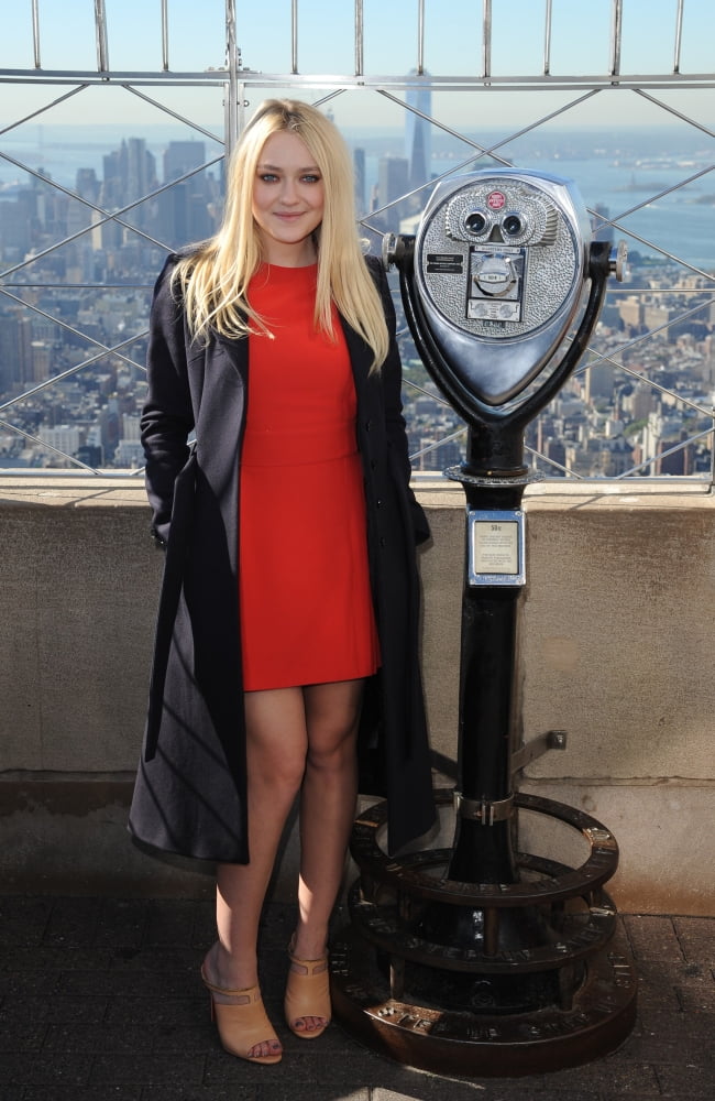 Dakota Fanning At A Public Appearance For Dakota Fanning Lights The Empire State Building In Red In Honor Of Save The Children & International Day Of The Girl, Empire State Building, New York, Ny