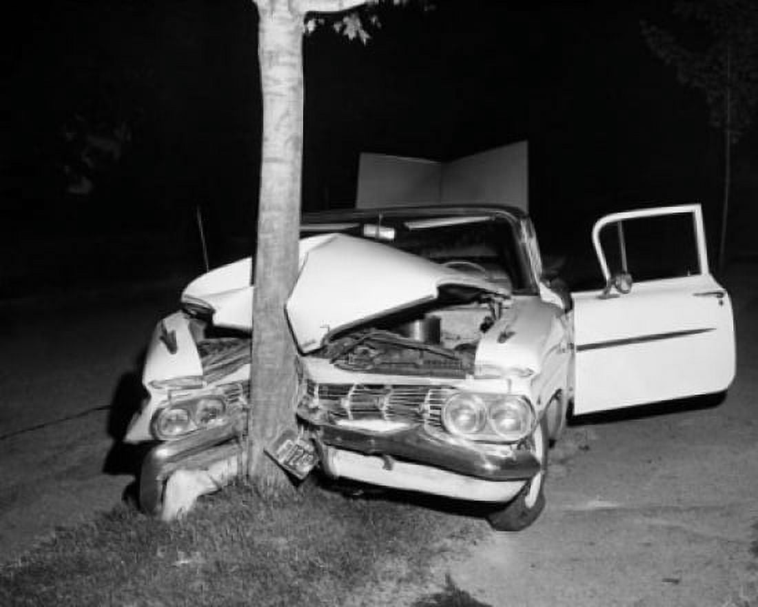 Damaged car after hitting a tree Canvas Art - (24 x 36)