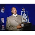 thumbnail image 1 of Damon Stoudamire Toronto Raptors Unsigned Holding 1995-96 NBA Rookie of the Year Trophy Photograph, 1 of 1