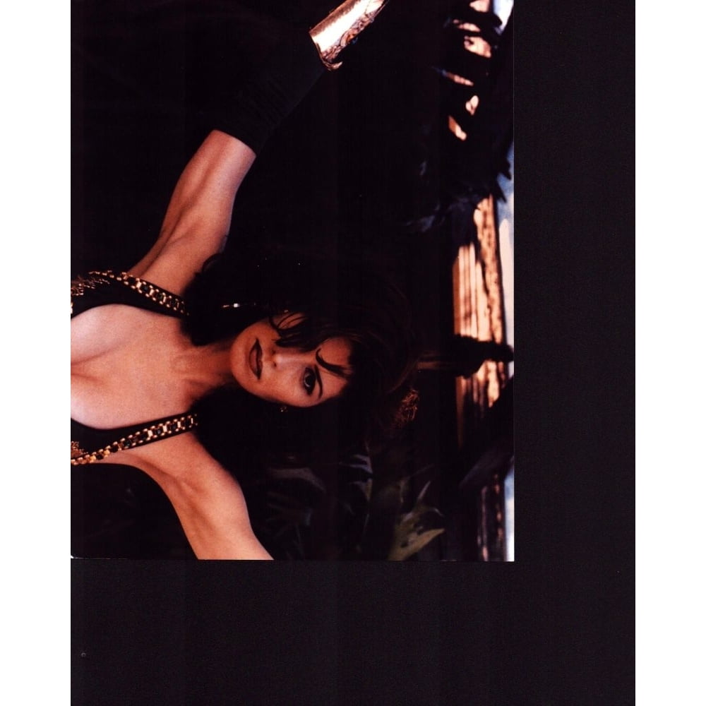 Dana Delany Wearing Gold And Black Outfit In Exit To