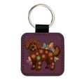 thumbnail image 1 of Dark Brown Golden Doodle Floral Motif Purple Dog Faux Leather Square Keychain, 1 of 7